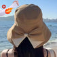 Cappello da donna con fiocco e tesa larga per proteggersi dal sole