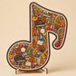 Puzzle in legno con note musicali