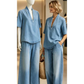 Completo estivo da donna in denim: top con scollo a V e pantaloni a gamba larga.
