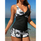 Completo composto da tankini a vita alta e shorts con stampa tropicale.