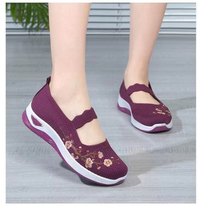 Scarpe casual in tessuto a maglia traspirante con suola morbida.