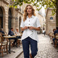 Camicia da donna asimmetrica a maniche corte con bottoni